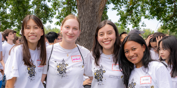 Female first-year students gather at a welcome BBQ at Williams Village